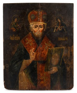 An antique Russian icon of St. Nicholas (Protector of the Weak), early 19th century, 46 x 38cm overall.