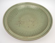 An impressive antique Chinese celadon glazed charger, Yuan/Ming Dynasty, displayed on an antique huanghuali stand, 44.5cm diameter. - 2