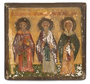 An antique hand-painted icon on wooden panel, depicting St. Cosma, St. Damian and St. Ann, bearing Slavic inscription, Balkans origin, 13 x 14cm.