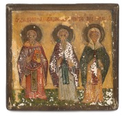 An antique hand-painted icon on wooden panel, depicting St. Cosma, St. Damian and St. Ann, bearing Slavic inscription, Balkans origin, 13 x 14cm.