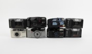 RICOH: Group of 1990s plastic point-and-shoot cameras, comprising LX-33W, RZ-700s, RZ-770, RZ-980SF Date, Shotmaster Zoom Super, XF-30, and XF-30D (2). (8 items) - 2