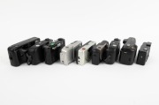 FUJICA/FUJIFILM: Group of 1980s-90s plastic point-and-shoot cameras, comprising Clear Shot II (2), DL-180 Tele Date, DL-1000 Zoom, Fotonex 210ix Zoom, Fotonex 10, MA-1, Nexia 20 Auto, and Pocket Fujica 450 Flash. (9 items) - 2