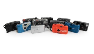 PLASTIC POINT-AND-SHOOT CAMERAS: 1980s-90s group comprising "Coca Cola", Dulux PC-606, Graflex Quantum 2000 AF, Hanimex EFP35, Hanimex Sensor (2), Hanimex Snapshot Brite, Nippon K-220, Panorama Wide Pic, Snap Sights (in underwater housing), and one anonym