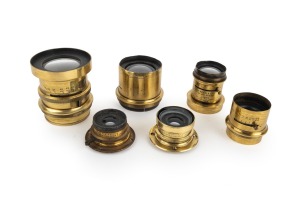 VARIOUS MANUFACTURERS: Group of late-20th century engraved brass lenses with iris diaphragms; manufacturers include Dallmeyer, Watson & Sons, and O. Sichel & Co.; the longest 6.5cm. (6 items)
