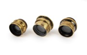 TAYLOR, TAYLOR & HOBSON: Group of late-19th century Cooke brass lenses with iris diaphragms, comprising Series III 6&frac12; x 4&frac34; Equifocus, Series III 7&frac12;" f6.5, and Series VII.A 8&frac12; x 6&frac12; Primoplane. (3 items)