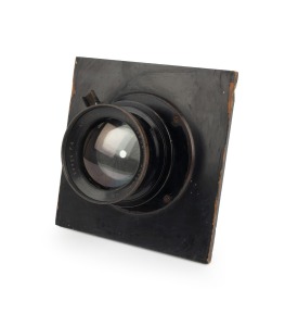 ROSS LONDON: Early-20th century Wide Angle Xpress 10" f4 brass lens [#117316], painted black, on lens board.