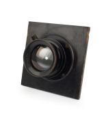 ROSS LONDON: Early-20th century Wide Angle Xpress 10" f4 brass lens [#117316], painted black, on lens board.