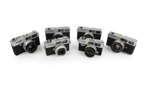 CANON: Group of c. 1960s rangefinder cameras, comprising the original Canonet model (3), Canonet 28, Canonet QL17, and Canonet QL25. (6 items)