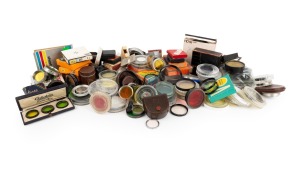 LENS FILTERS: A large and diverse accumulation, of varying size and hue, as well as a quantity of close-up filters, most still in retail packaging or plastic case, from such manufacturers as Arrow, Hoya, Petri, Ricoh, Voigtl&auml;nder, and Walz. (100s)
