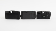 CANON: Group of 1990s-2000s plastic point-and-shoot cameras, comprising Snappy S (teal), Sure Shot 60 Zoom SAF, and Sure Shot Owl. (3 items) - 2