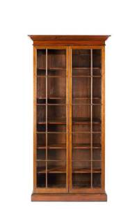 Tasmanian Colonial cedar bookcase in the Sheraton style, c1835. Finely crafted in full cedar with 2 astragal glazed doors & adjustable shelves. Height 234cm, width 115cm, depth 45cm. Provenance: The Estate of the late Christopher Pearson Adelaide