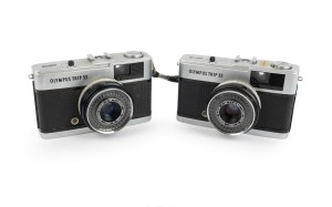 OLYMPUS: Two c. 1960s Olympus Trip 35 viewfinder cameras with D. Zuiko 40mm f2.8 lenses.
