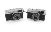 OLYMPUS: Two c. 1960s Olympus Trip 35 viewfinder cameras with D. Zuiko 40mm f2.8 lenses.