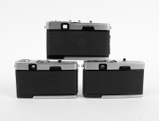 OLYMPUS: Three c. 1960s Olympus Trip 35 viewfinder cameras with D. Zuiko 40mm f2.8 lenses. - 2