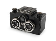 GOMZ Bakelite-body Sputnik stereo TLR camera, c. 1955, with twin T-22 75mm f4.5 lenses.