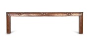 An antique Arts & Crafts hand-beaten copper fire curb, circa 1900, ​​​​​​​5cm high, 139cm wide, 38cm deep.