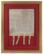 An antique indenture dated August 1672 on vellum, attractively framed and mounted, 54 x 43cm overall.
