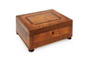 TASMANIAN WORK BOX: Circa 1850. Musk, huon pine, beefwood, fiddleback blackwood, myrtle & cedar, with original bun feet. Width 29cm, depth 22cm, 13cm.