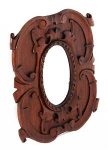 Robert Prenzel (attributed) carved blackwood framed mirror. Height 53cm, width 43cm