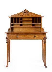 Australian Art Nouveau desk from the workshop of Robert PRENZEL. Blackwood with ornately carved waratah decoration to legs & top, c1910. Height 128cm, width 91cm, depth 55cm