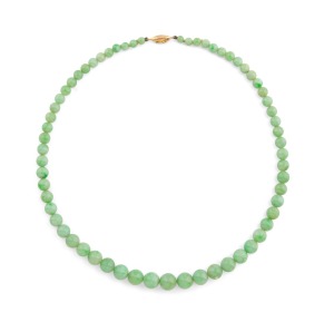 A vintage Chinese jade bead necklace with gold clasp, early 20th century, 41cm long.