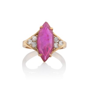 An 18ct gold ruby and diamond ring, stamped "18K", 4.2 grams total.