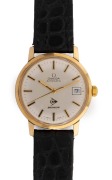 OMEGA automatic wristwatch in 9ct solid gold case with baton numerals and date window, branded on the dial for the company Dunlop, bearing inscription from Dunlop verso to an employee in recognition of twenty-five years of employment, 38mm wide including - 2