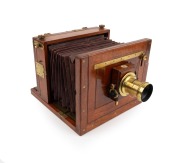 Stereo tailboard camera, late 19th century, plate dimensions 12.5 x 20cm, uninscribed monocular brass lens with iris diaphragm, Thornton-Pickard roller-blind shutter.