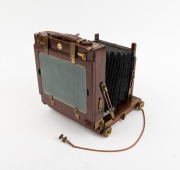 THORNTON-PICKARD: "Ruby" triple-extension view camera, late 19th century, plate dimensions 12 x 16.5cm, Taylor, Taylor & Hobson Cooke Series V 4&frac14; x 3&frac14; 5-7" brass lens, Thornton-Pickard roller-blind shutter, "Antinuous" shutter release. - 2