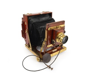 THORNTON-PICKARD: "Imperial" triple-extension view camera, early 20th century, plate dimensions 11.5 x 16.5cm, Thornton-Pickard Beck Symmetrical lens with cap, Thornton-Pickard roller-blind shutter, "Antinuous" shutter release.