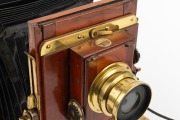 THORNTON-PICKARD: "Imperial" triple-extension view camera, early 20th century, plate dimensions 11.5 x 16.5cm, Thornton-Pickard Beck Symmetrical lens with cap, Thornton-Pickard roller-blind shutter, "Antinuous" shutter release. - 2