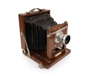 View camera, early 20th century, plate dimensions 12 x 16cm, uninscribed aluminium lens, "Carter & Werner Ballarat" retailer's plate.