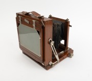 View camera, early 20th century, plate dimensions 12 x 16cm, uninscribed aluminium lens, "Carter & Werner Ballarat" retailer's plate. - 2