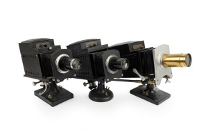 MAGIC LANTERNS: Early 20th-century group comprising Ensign No. 6 Optiscope (2) and Ensign No. 9 Optiscope. (3 items)