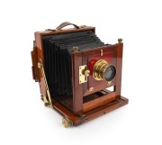 View camera, late 19th century, plate dimensions 12 x 16cm, Thornton-Pickard "Rectoplanat" lens, "Baker & Rouse" retailer's inlay.
