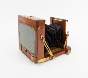 View camera, late 19th century, plate dimensions 12 x 16.5cm, uninscribed brass lens with aperture ring, "Baker & Rouse Melbourne & Adelaide" retailer's inlay. - 2