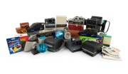 POLAROID: A 1970s-2000s accumulation of cameras, accessories, film packs, and ephemera; noted Polaroid Miniportrait 402 and Polaroid Impulse. (qty.)