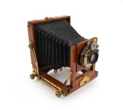 View camera, late-19th century, plate dimensions 11 x 8cm, brass lens with Bausch & Lomb pneumatic shutter.