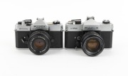 FUJICA: Group of 1970s SLRs, comprising ST605 (Super-Takumar 55mm f1.8), ST701 (Fujinon 55mm f1.8), STX-1 (X-Fujinon 55mm f2.2), and STX-1N (X-Fujinon FM 50mm f1.9). (4 items) - 2