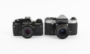 KAMERA-WERKST&Auml;TTEN: Group of 1970s SLRs, comprising Praktica BC1 Electronic (Prakticar 50mm f2.4), Praktica L2 (Fujinon 29-47mm f3.5-4.2), Praktica L3 (Super Albinar MC Auto 28mm f2.8, with cap), and Praktica Super TL (Jena 50mm f2.8). (4 items) - 3