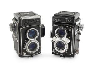 YASHICA: Pair of c. 1950s TLRs, comprising Yashica 635 (Yashikor 80mm f3.5/Copal-MXV) and Yashicaflex (Heliotar 80mm f3.5/Copal). (2 items)