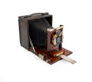 GUNDLACH: "Korona II" folding camera, c. 1920s, plate dimensions 9.5 x 12cm, Wollensak pneumatic shutter.
