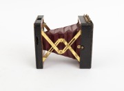 MONROE: "Pocket Monroe A" strut-folding camera, c. 1897, brass fittings, red bellows. - 2
