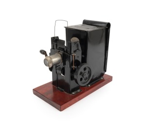 KEYSTONE: "Moviegraph" film-strip projector, c. 1920s; height 23cm.
