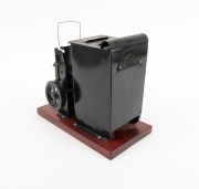 KEYSTONE: "Moviegraph" film-strip projector, c. 1920s; height 23cm. - 2