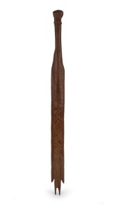 A tribal club with incised geometric decoration and sea turtle design on reverse, unknown origin, ​​​​​​​86cm long.