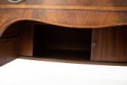 An English Sheraton period bow front mahogany sideboard with rosewood cross banding, ebony and boxwood stringing, and unusual recessed tambor front storage beneath the central drawer, circa 1800, attractive smaller size 84cm high, 168cm wide, 75cm deep. - 5