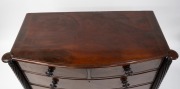 An antique English bow front mahogany chest of five drawers with cock-beading, full length quill turned columns with castle tops and turned bun feet, circa 1845, stamped "KERBY, 545 New Oxford Street", 102cm high, 119cm wide, 51cm deep. - 2