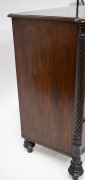 An antique English bow front mahogany chest of five drawers with cock-beading, full length quill turned columns with castle tops and turned bun feet, circa 1845, stamped "KERBY, 545 New Oxford Street", 102cm high, 119cm wide, 51cm deep. - 3