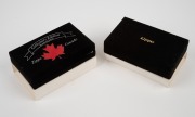 ZIPPO "PEARL HARBOR" 60th Anniversary limited edition lighter in original plush box; together with a ZIPPO CANADA "COLLECTOR'S EDITION Numbered Series" limited edition lighter in original plush box. (2 items). - 2